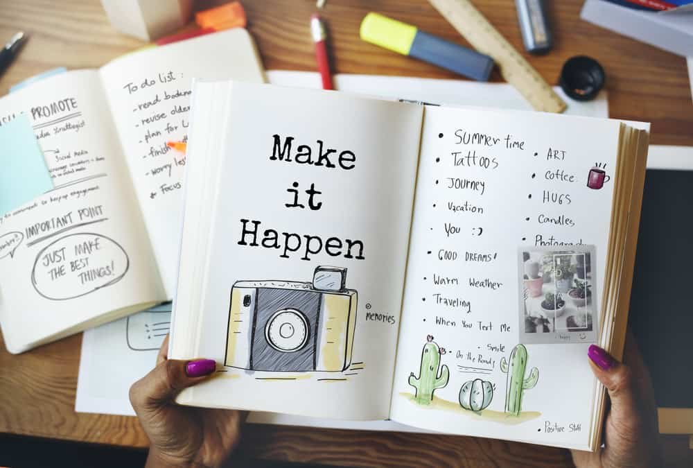 woman giving surprise wrapped gift to man as she covers his eyes with her hand - anniversary gift ideas for him